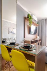 Et tv og/eller underholdning på Descanse perto da USP - HRAC - Facop e Shopping Bauru