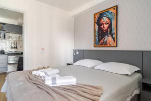 En eller flere senge i et værelse på Descanse perto da USP - HRAC - Facop e Shopping Bauru