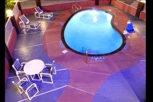Bazén v ubytování Texas Inn & Suites McAllen at La Plaza Mall and Airport nebo v jeho okolí