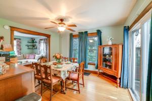 a kitchen and dining room with a table and chairs at 1 Mi to Dtwn Binghamton Pet-Friendly Home with Deck in Binghamton