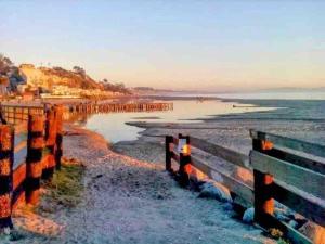 a view of a beach with a wooden fence at Aptos Beach Retreat Hot Tub & 5 Min Walk to Sand in Rio Del Mar