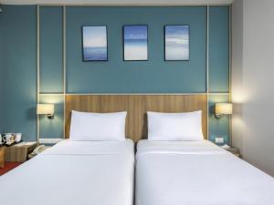 Ένα ή περισσότερα κρεβάτια σε δωμάτιο στο Hotel Ibis Samui Bophut +65 φωτογραφίες