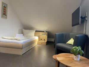 Μια τηλεόραση ή/και κέντρο ψυχαγωγίας στο 1-bedroom holiday home