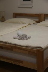 Ένα ή περισσότερα κρεβάτια σε δωμάτιο στο The Rest Nest