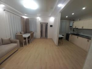a living room with a couch and a table at Rent house Vanadzor centre in Vanadzor