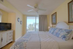 Katil atau katil-katil dalam bilik di Crescent Shores South - 108 +30 gambar