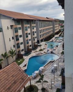 an overhead view of a hotel with a swimming pool at Flat na Praia dos Carneiros a 250m do mar in Tamandaré