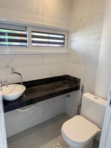 Phòng tắm tại Flamingos Pipa 09 - Jacuzzi e piscina