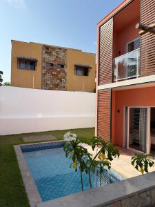 Hồ bơi trong/gần Flamingos Pipa 09 - Jacuzzi e piscina