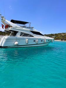 a white boat in the water in the ocean at Exclusive 2 in Cesme