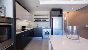 Η κουζίνα ή μικρή κουζίνα στο CENTURY CLUB - Luxury Apartment Hotels