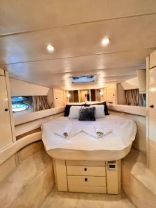 a large bed in the middle of a room at Exclusive 2 in Cesme