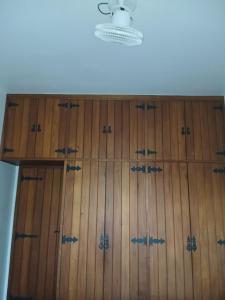 a wall of wooden lockers in a room at Ita Green in Teresópolis +14 photos