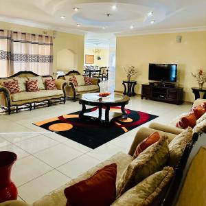 Et tv og/eller underholdning på Hujeen Guest House