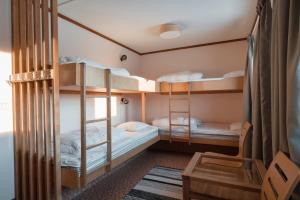 Ένα ή περισσότερα κρεβάτια σε δωμάτιο στο Trillevallens Högfjällshotell & Lägenheter +85 φωτογραφίες