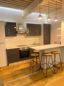 Una cocina o cocineta en Le cosy pierre scize