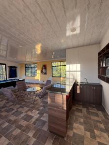 a kitchen with a table and chairs in a room at Finca Formentera Relax in San Javier