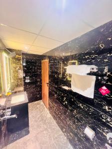 a bathroom with a view of a city at Mahant Ji Residency in Varanasi +111 photos