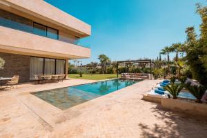 Πισίνα στο ή κοντά στο Villa Hicham Golf Marrakech