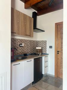 Η κουζίνα ή μικρή κουζίνα στο Mimi