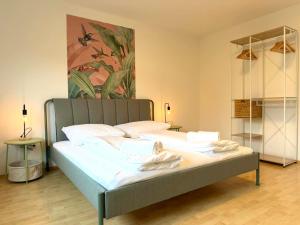 Postel nebo postele na pokoji v ubytování Perfekt für 4-6! Küche Garage Nespresso S-Bahnhof