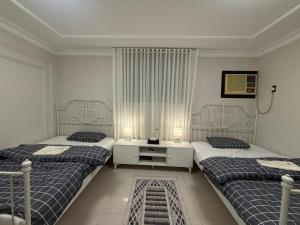 Ένα ή περισσότερα κρεβάτια σε δωμάτιο στο Enjoy a quiet stay with a high view and complete privacy