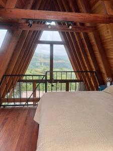 Ένα ή περισσότερα κρεβάτια σε δωμάτιο στο Chalé Capim Santo +16 φωτογραφίες