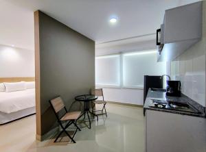 Una cocina o cocineta en Atlantis Suites -Amoblados- Buenavista Barranquilla