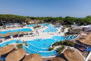 an overhead view of a pool at a resort at Ca' Pasquali Village in Cavallino-Treporti