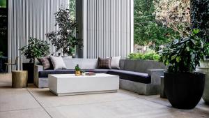 a living room with a couch and a coffee table at Midtown Luxury with Skyline Views in Atlanta