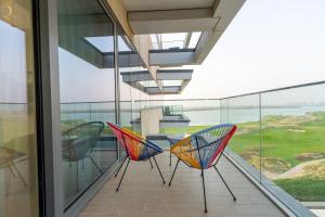 Balkón nebo terasa v ubytování Maison d'Or The waterfront Haven 2BR Mayan