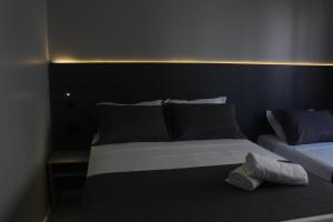 Ένα ή περισσότερα κρεβάτια σε δωμάτιο στο Hotel Di Sica