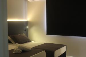 Ένα ή περισσότερα κρεβάτια σε δωμάτιο στο Hotel Di Sica +19 φωτογραφίες