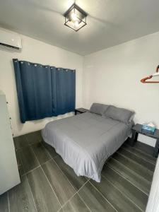 Postel nebo postele na pokoji v ubytování Lane Oceanview Villa