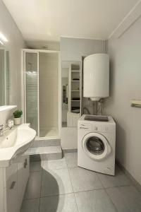 Vannituba majutusasutuses Centre ville - cosy appartement - sous les parapluies +39 fotot