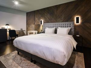 Ένα ή περισσότερα κρεβάτια σε δωμάτιο στο Pullman Riga Old Town - Renovated 2025