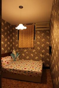 Letto o letti in una camera di Ku Shan Yuan Hotel