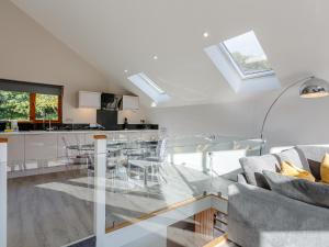 a kitchen and living room with a glass table at Waterside Lodge Three - Uk33350 in Southowram