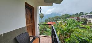 a balcony with a view of a mountain at Hotel Colonial Campestre in UniÃ³n JuÃ¡rez