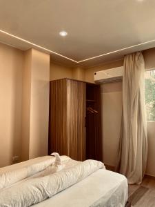 Postel nebo postele na pokoji v ubytování Pyramids Hotel &Free pickup shuttle