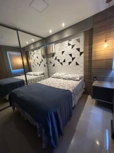 Postel nebo postele na pokoji v ubytování Apartamento mobiliado com excelente localização em Maceió + 13 fotografií