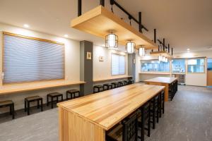 Kuchyň nebo kuchyňský kout v ubytování UDON na HOTEL 琴平