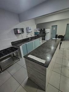 Η κουζίνα ή μικρή κουζίνα στο Pousada Bella Praia