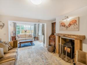 Posezení v ubytování Nurseries Cottage