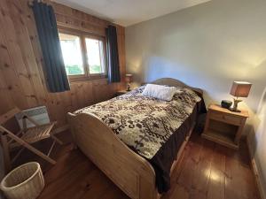 Ένα ή περισσότερα κρεβάτια σε δωμάτιο στο Appartement 4 pièces pour 6 personnes à Méribel avec parking privé - FR-1-180-664