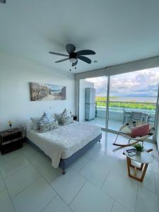 Ένα ή περισσότερα κρεβάτια σε δωμάτιο στο Apartamento en Cartagena cerca al hotel las Américas +28 φωτογραφίες