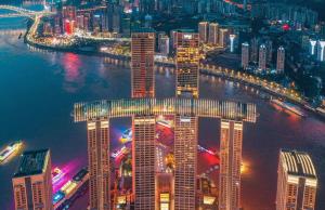 an aerial view of a city at night at Futinger High-altitude River View Hotel in Chongqing