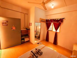 Ένα ή περισσότερα κρεβάτια σε δωμάτιο στο 玖月舒苑