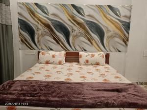 Ένα ή περισσότερα κρεβάτια σε δωμάτιο στο Wildlife Homestay