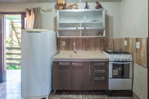 Η κουζίνα ή μικρή κουζίνα στο Pousada Rosa Ibira